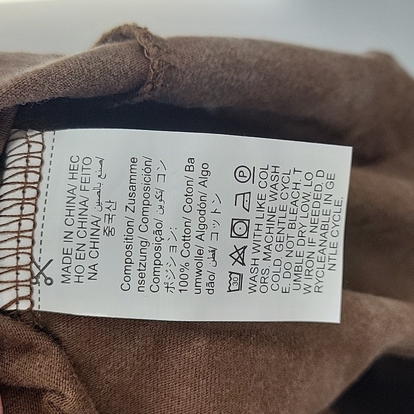 Brown Graphic Sleeveless Top with Red Accents - Picture 10 of 13